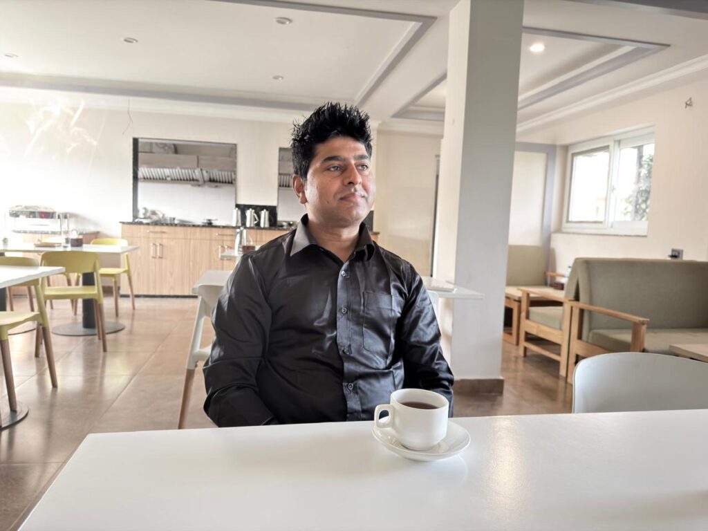 Mr Universe in Mid Hill Farm Resort taking herbal tea